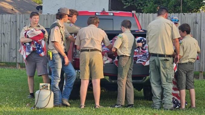 Members of two local scout troops helped with Friday's flag retirement ceremony. (Angela Norris photo)