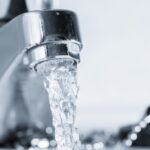 Water coming out of the faucet  