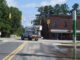 A Duke Power truck carefully makes its way through the Hallsboro intersection under the dark stoplights.