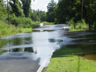 Flooding is continuing throughout some areas of the county, leading to blocked roads like Red Bug at Hallsboro.