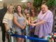 Angie Fowler cuts the ribbon officially opening Down South Home and Decor and Gifts last week. (Ben Proctor photo)