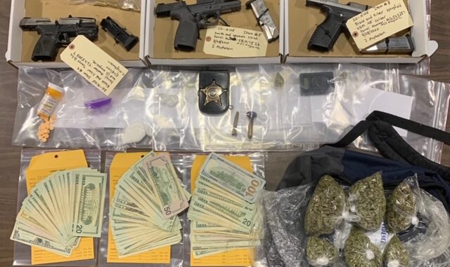 Drugs and several firearms -- including one that was reported stolen in Bladen County -- were confiscated in the second raid on the Whiteville area home.