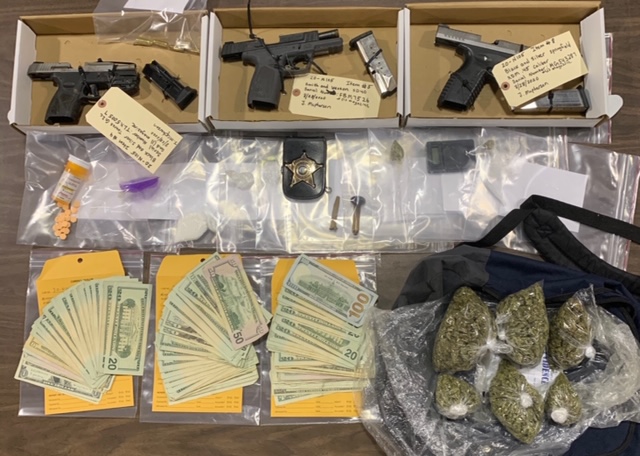 Drugs and several firearms -- including one that was reported stolen in Bladen County -- were confiscated in the second raid on the Whiteville area home.