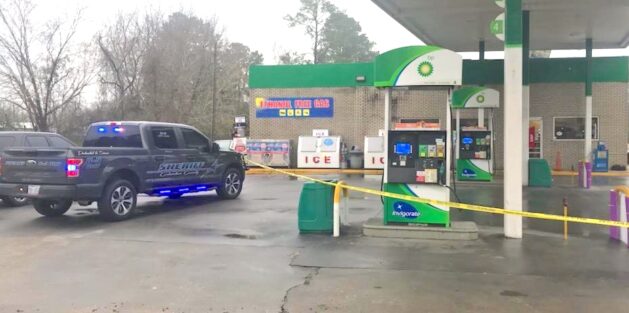 Crime scene tape surrounded the gas pumps and front door of the Sam's Pit Stop Saturday after a man was stabbed.
