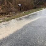 Rising water across the county is causing dangerous road conditions in many areas, such as this flooding along Peacock Road. (Submitted photo)