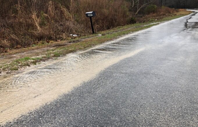Rising water across the county is causing dangerous road conditions in many areas, such as this flooding along Peacock Road. (Submitted photo)