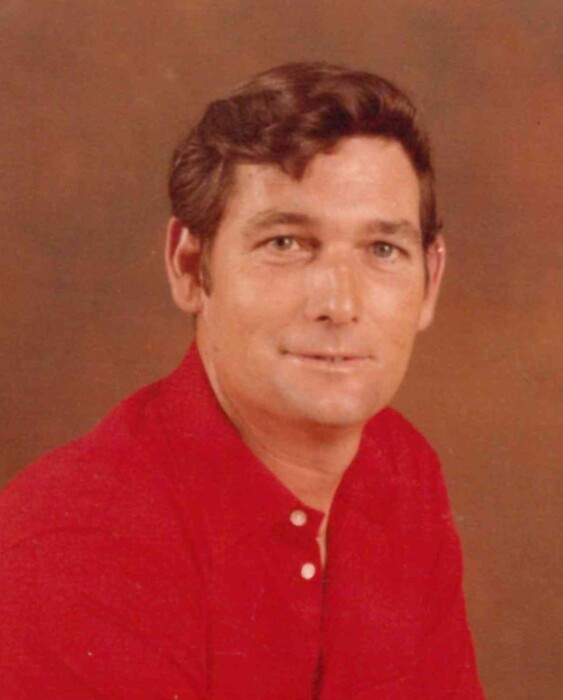 A man wearing a red shirt