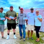 Left to right: Third place winners Dalton Pridgen and Hugh Smith (who took home the prize for Biggest Bass, at 6.1lbs); first place winner John Norris with a bundle weighing 20.4 lbs; and second place winners Tom Elliott and Lindsey Musselwhite.