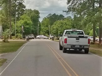 Lake Waccamaw Police and Park Rangers have taken a man into custody after witnesses said he stole a firearm, then hid in a camper on Bella Coola. (Submitted photo)