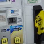 Yellow out of order bags cover gas nozzles at many stations across the area.