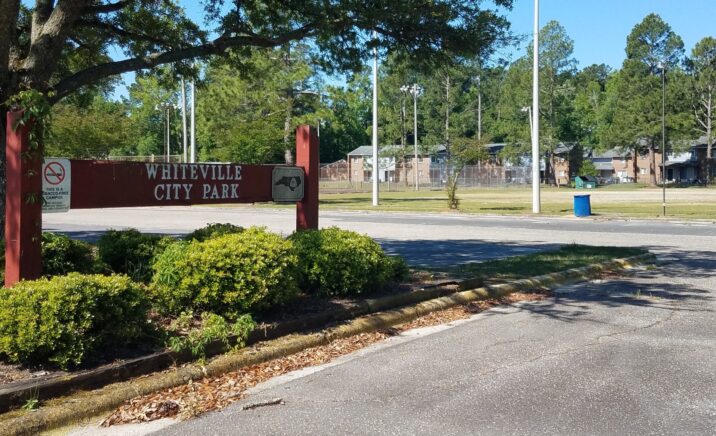 The Nolan Park complex surrounds Sandy Ridge Apartments on three sides.