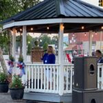 Lori Harper sings for the crowd at Monday's ceremony in Tabor City.