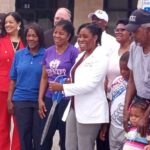 Dr. A. Nicole Jenkins is surrounded by family and friends as she officially opened her practice in Whiteville.