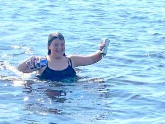 Lakyn Wilson took it upon herself to collect bottles and cans from Lake Waccamaw after a another girl cut her foot on a broken bottle.
