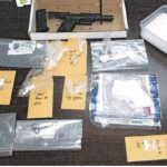 The joint operation turned up $6,000 in cash, cocaine, methamphetamine, and a handgun (WPD photo)