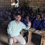 Rev_.-Robert-Nealey-with-students