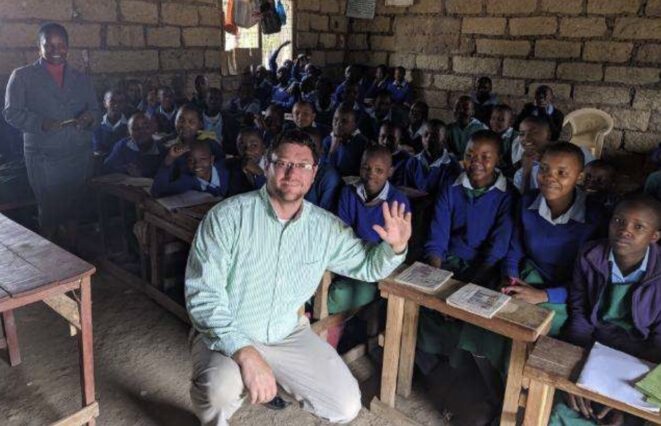 Rev_.-Robert-Nealey-with-students