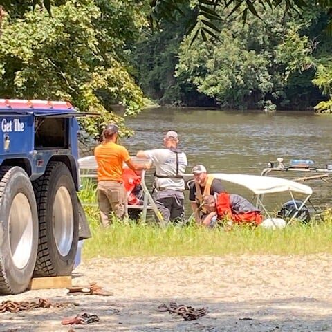 Teams had to take frequent breaks due to the extreme heat and strong current in the river Monday. (CCSO photo)