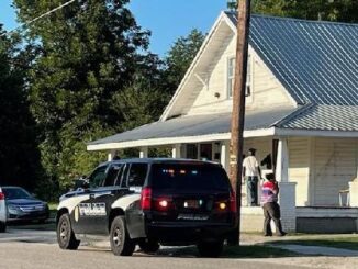 Deputies arrested at least one man -- who refused to give his name to authorities -- in the raid on this home (Kandi Thompson photo)