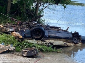 The burned-remains of this 1980s Ford Mustang were finally recovered after ten hours of work Monday. (CCSO photo)