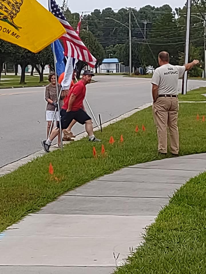 The volunteers raise the flags every patriotic holiday to remind Lake Waccamaw residents and visitors about the price of freedom.