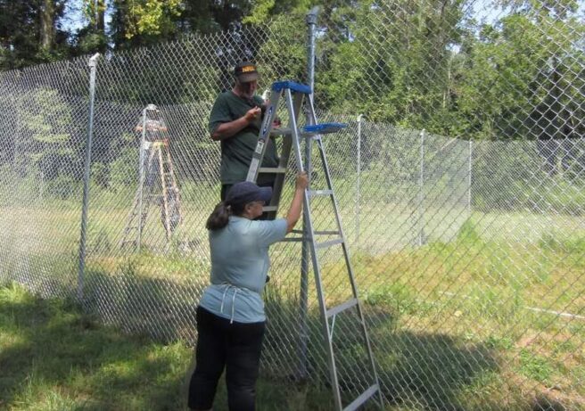 Volunteers spent the Sept. 11 working on new fences at the wildcat rescue. (submitted photo)