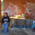 Christy Harrelson with some of her decorations, waiting for early trick or treaters.