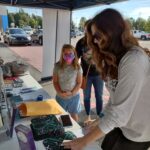 Lucy Byrd accepts a donation from one of the younger benefactors Friday. (Crystal Faircloth photo)