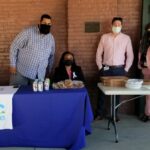 People staffing the NCWorks booth had snacks and pizza for jobseekers. (Jeff Allen photo)