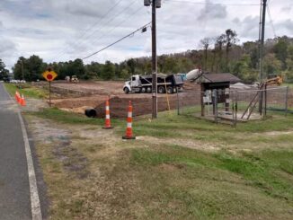 What has been an informal asking lot for years at Lake Waccamaw is now being paved and officially designated for public use.