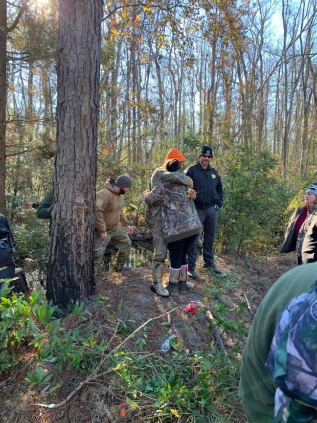 Abernatrhy is greeted by family after his overnight ordeal in the Green Swamp. (CCSO photo)