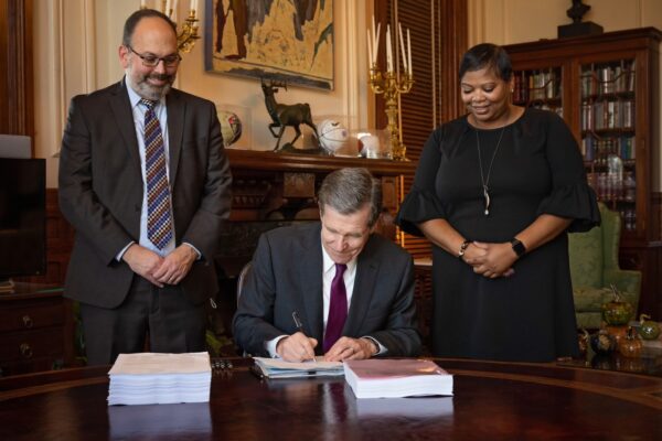 Gov. Roy Cooper signed the state's first new budget since 2017 into law today. (Courtesy Governor's Office)
