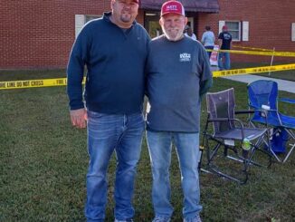 Mayor Elect Matt Wilson and his father Rodney working the polls Tuesday morning (Crystal Faircloth photo)