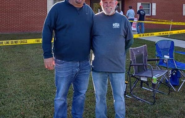 Mayor Elect Matt Wilson and his father Rodney working the polls Tuesday morning (Crystal Faircloth photo)