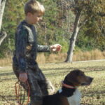 A participant gets ready to go during the treeing contest Saturday.