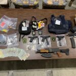 Investigators seized illegal firearms, narcotics, marijuana and cash in a series of raids near Tabor city this week. (CCSO photo)