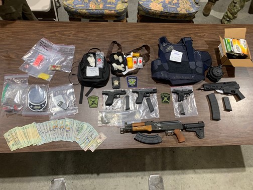 Investigators seized illegal firearms, narcotics, marijuana and cash in a series of raids near Tabor city this week. (CCSO photo)
