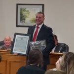 Outgoing Mayor Daniel Hilburn was honored with a "key" to the lake as well as a resolution honoring his service Tuesday.