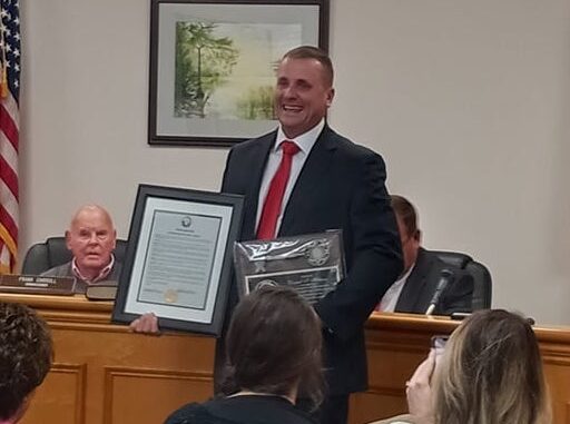 Outgoing Mayor Daniel Hilburn was honored with a "key" to the lake as well as a resolution honoring his service Tuesday.