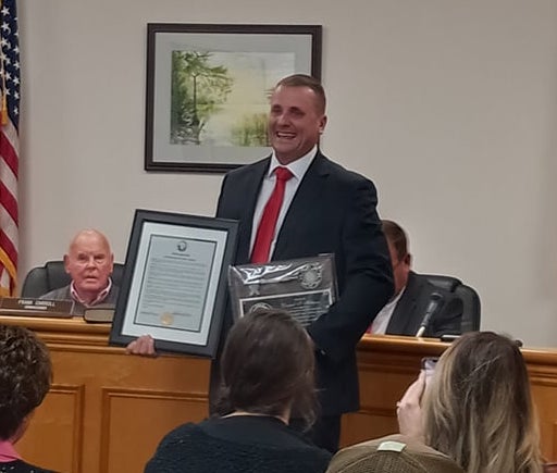 Outgoing Mayor Daniel Hilburn was honored with a "key" to the lake as well as a resolution honoring his service Tuesday.