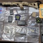 Drugs, cash and a firearm were seized after a raid in bolton. (CCSO photo)