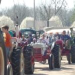 The Parade of Power -- one of the largest antique tractor parades in the state-- returns Saturday with Southern Farm Days. (file photo)