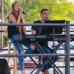 Ryleigh Madison and Dustin Chapman at Thursday's concert in Whiteville. (Jeff Reichert)