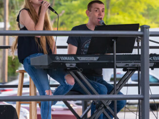 Ryleigh Madison and Dustin Chapman at Thursday's concert in Whiteville. (Jeff Reichert)