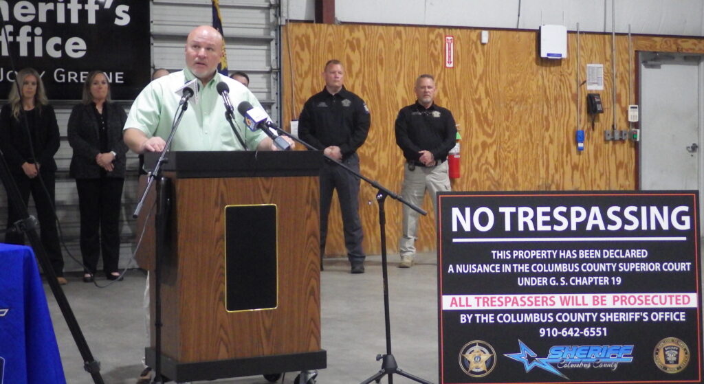 Mayor Britt speaks at Friday's press conference. To his right are Chief Deputy Aaron Herring and Sheriff Jody Greene.