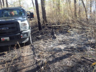 NCFS personnel are on the scene of a wildfire that has caused N.C. 211 to close at the Brunswick line. (File photo)