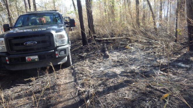 NCFS personnel are on the scene of a wildfire that has caused N.C. 211 to close at the Brunswick line. (File photo)