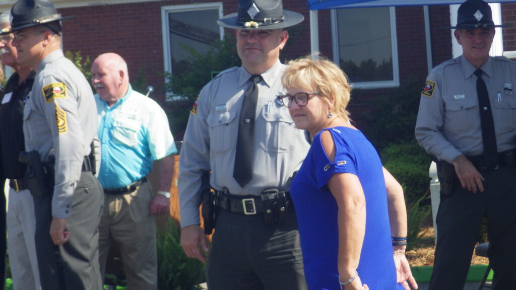 Kay Conner with one of the troopers at Friday's service.