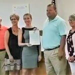 Megan Kopek received a copy of a declaration recognizing International Widows Day at Tuesday's Lake Waccamaw Town Commissioners meeting. Mayor Matt Wilson presented the proclamation, which was read by Commissioner Rosemary Dorsey.
