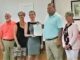 Megan Kopek received a copy of a declaration recognizing International Widows Day at Tuesday's Lake Waccamaw Town Commissioners meeting. Mayor Matt Wilson presented the proclamation, which was read by Commissioner Rosemary Dorsey.